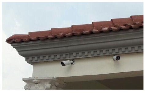 solution The Milesight Mini Bullet Network Cameras installed on the exterior wall of the Royal Palace of Benin.